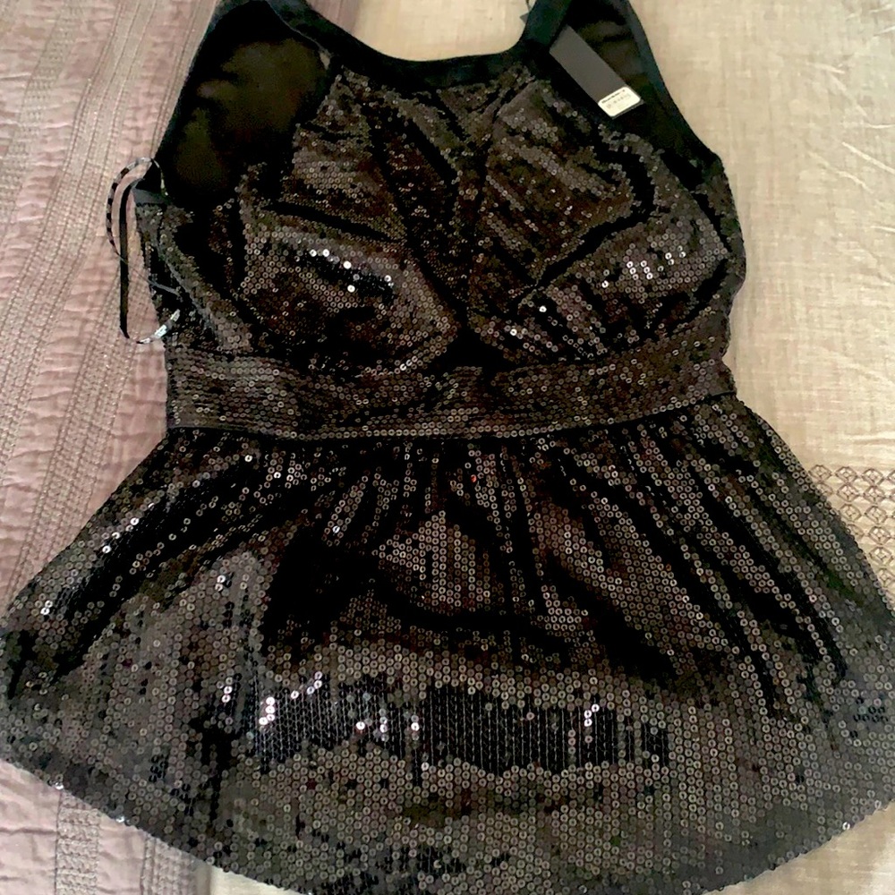 BKE boutique. Sequined open back night on the town top. Sleeveless.